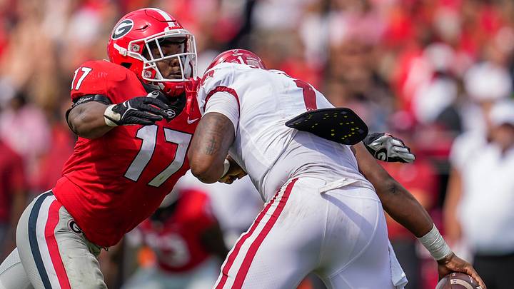 Oct 2, 2021; Athens, Georgia, USA; Georgia Bulldogs linebacker Nakobe Dean (17) tackles Arkansas Razorbacks quarterback KJ Jefferson (1) during the second half at Sanford Stadium. Mandatory Credit: Dale Zanine-USA TODAY Sports
