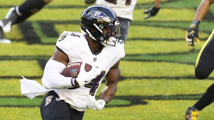 Dec 2, 2020; Pittsburgh, Pennsylvania, USA;  Baltimore Ravens linebacker Tyus Bowser (54) returns an interception in the end-zone against the Pittsburgh Steelers during the first quarter at Heinz Field. Mandatory Credit: Charles LeClaire-USA TODAY Sports