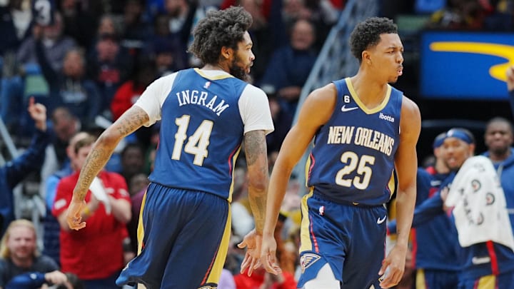 Nov 16, 2022; New Orleans, Louisiana, USA; New Orleans Pelicans guard Trey Murphy III (25) and forward Brandon Ingram (14) react to a three point shot against the Chicago Bulls during the second quarter at Smoothie King Center.