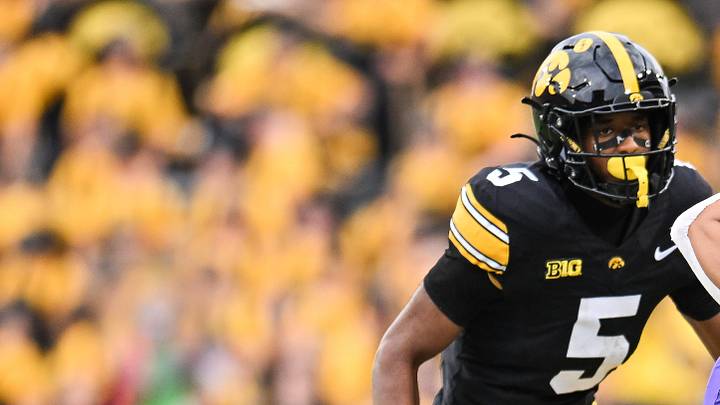 Sep 19, 2026; Iowa City, Iowa, USA; UNI Panthers wide receiver Tay Norman (4) is tackled by Iowa Hawkeyes defensive back Darion Jones (1) as defensive back Anthony Hawkins (5) looks on during the third quarter at Kinnick Stadium. Mandatory Credit: Jeffrey Becker-Imagn Images Sep 19, 2026; Iowa City, Iowa, USA; UNI Panthers wide receiver Tay Norman (4) is tackled by Iowa Hawkeyes defensive back Darion Jones (1) as defensive back Anthony Hawkins (5) looks on during the third quarter at Kinnick Stadium. Mandatory Credit: Jeffrey Becker-Imagn Images