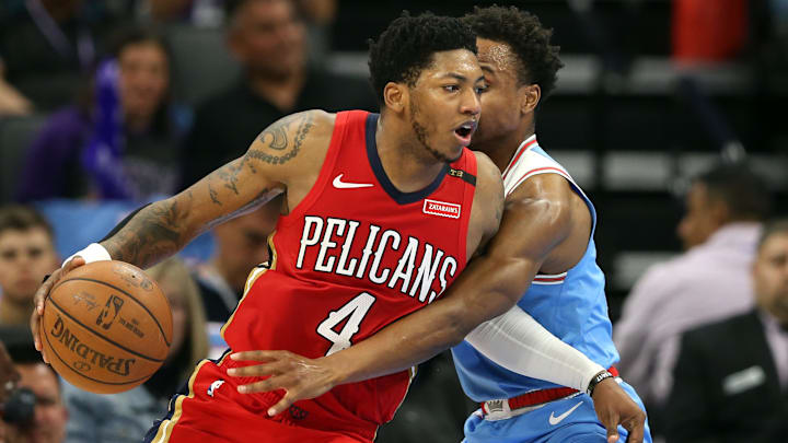 Apr 7, 2019; Sacramento, CA, USA; New Orleans Pelicans guard Elfrid Payton (4) handles the ball while being defended by Sacramento Kings guard Yogi Ferrell (3) during the fourth quarter at Golden 1 Center. Apr 7, 2019; Sacramento, CA, USA; New Orleans Pelicans guard Elfrid Payton (4) handles the ball while being defended by Sacramento Kings guard Yogi Ferrell (3) during the fourth quarter at Golden 1 Center.