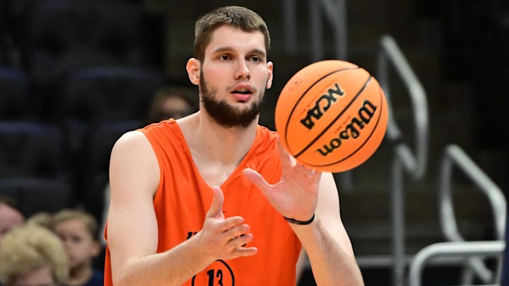 Mar 20, 2025; Milwaukee, WI, USA; Illinois Fighting Illini center Tomislav Ivisic (13) works out NCAA Tournament First Round Practice at Fiserv Forum. Mandatory Credit: Benny Sieu-Imagn Images Mar 20, 2025; Milwaukee, WI, USA; Illinois Fighting Illini center Tomislav Ivisic (13) works out NCAA Tournament First Round Practice at Fiserv Forum. Mandatory Credit: Benny Sieu-Imagn Images