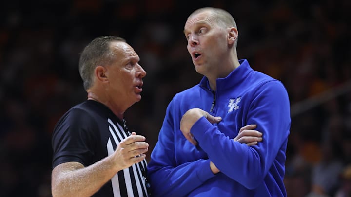 Jan 17, 2026; Knoxville, Tennessee, USA;  Kentucky Wildcats head coach Mark Pope speaks with an official during the first half against the Tennessee Volunteers at Thompson-Boling Arena at Food City Center. Mandatory Credit: Randy Sartin-Imagn Images