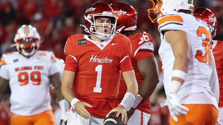 Oct 17, 2026; Houston, Texas, USA; Houston Cougars quarterback Conner Weigman (1) reacts after running for a first down during the fourth quarter against the Oklahoma State Cowboys at TDECU Stadium. Mandatory Credit: Troy Taormina-Imagn Images