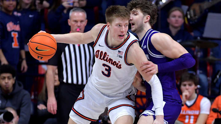 Jan 26, 2025; Champaign, Illinois, USA;  Illinois Fighting Illini forward Ben Humrichous (3) drives the b all against Northwestern Wildcats forward Nick Martinelli (2) during the second half at State Farm Center. Mandatory Credit: Ron Johnson-Imagn Images