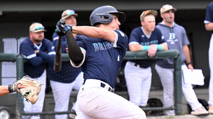 ORLEANS 7/05/22  Carson Demartini of Brewster gets hold of an  Orleans pitch for a two run triple.