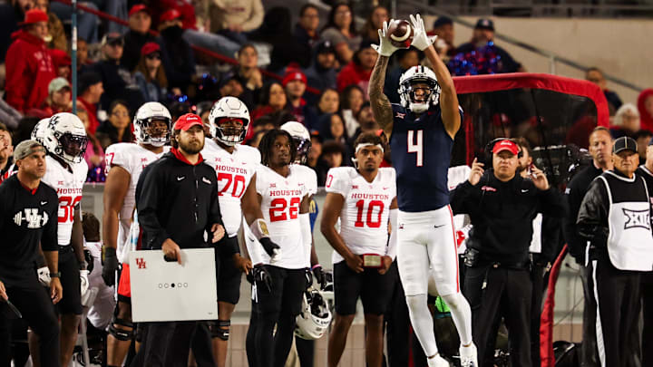 Nov 15, 2024; Tucson, Arizona, USA; Arizona Wildcats wide receiver Tetairoa McMillan (4) catches the ball during the third quarter against the Houston Cougars at Arizona Stadium.