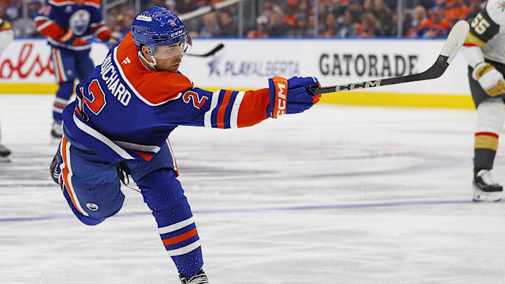 Edmonton Oilers defensemen Evan Bouchard (2) takes a shot.