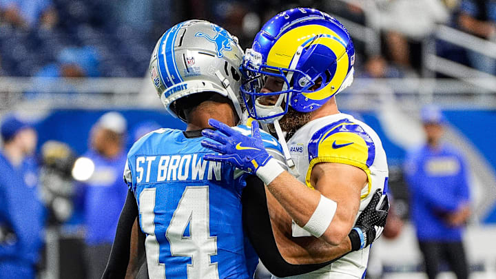 Detroit Lions wide receiver Amon-Ra St. Brown (14) hugs Los Angeles Rams wide receiver Cooper Kupp (10) during warm up at Ford Field in Detroit on Sunday, September 8, 2024. Detroit Lions wide receiver Amon-Ra St. Brown (14) hugs Los Angeles Rams wide receiver Cooper Kupp (10) during warm up at Ford Field in Detroit on Sunday, September 8, 2024.