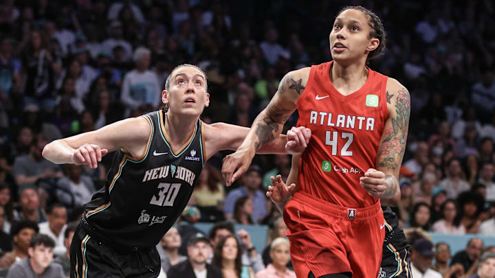 Jul 13, 2025; Brooklyn, New York, USA;  New York Liberty forward Breanna Stewart (30) and Atlanta Dream center Brittney Griner (42) box out for a rebound in the first quarter  at Barclays Center. Mandatory Credit: Wendell Cruz-Imagn Images