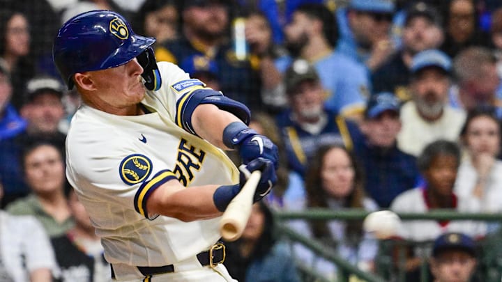 Mar 26, 2026; Milwaukee, Wisconsin, USA;  Milwaukee Brewers first baseman Andrew Vaughn (28) drives in a run with a base hit in the sixth inning against the Chicago White Sox at American Family Field. Mandatory Credit: Benny Sieu-Imagn Images