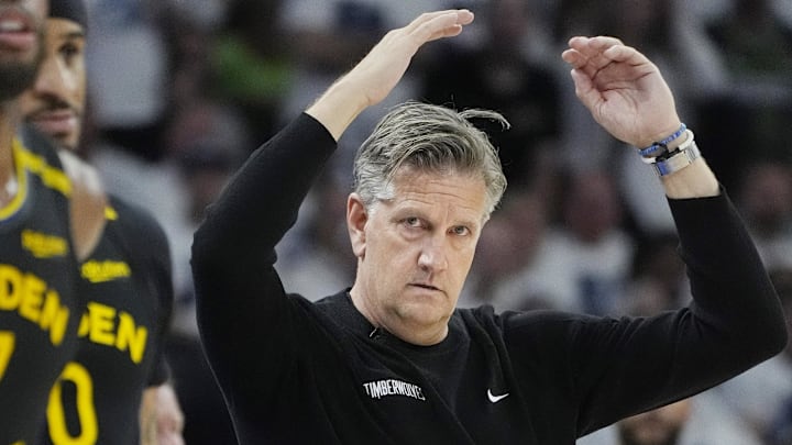 May 6, 2025; Minneapolis, Minnesota, USA; Minnesota Timberwolves head coach Chris Finch watches as his team plays the Golden State Warriors in the third quarter during game one of the second round for the 2025 NBA Playoffs at Target Center.
