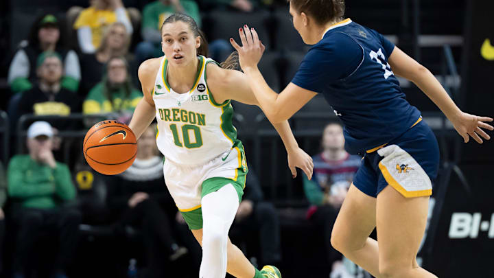 Oregon guard Peyton Scott moves the ball up the court as the Oregon Ducks host the UC Irvine Anteaters Thursday, Dec. 19, 2024 at Matthew Knight Arena in Eugene, Ore. Oregon guard Peyton Scott moves the ball up the court as the Oregon Ducks host the UC Irvine Anteaters Thursday, Dec. 19, 2024 at Matthew Knight Arena in Eugene, Ore.
