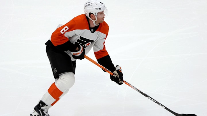 Mar 20, 2025; Washington, District of Columbia, USA; Philadelphia Flyers defenseman Cam York (8) controls the puck during the third period against the Washington Capitals at Capital One Arena. Mandatory Credit: Daniel Kucin Jr.-Imagn Images