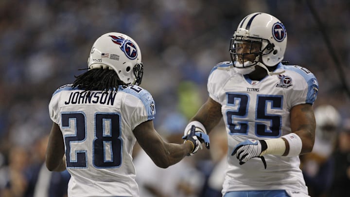 November 27, 2008; Detroit, MI, USA; Tennessee Titans running back LenDale White (25) congratulates fellow running back Chris Johnson (28) after a first quarter touchdown against the Detroit Lions at Ford Field. The Titans defeated the Lions 47-10. Mandatory Credit: Leon Halip-Imagn Images