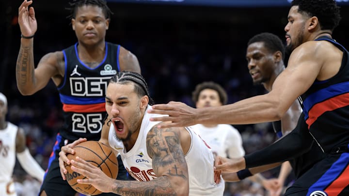 Feb 27, 2026; Detroit, Michigan, USA; Cleveland Cavaliers guard Jaylon Tyson (20) grabs a rebound away from Detroit Pistons guard Marcus Sasser (25) and Detroit Pistons forward Tobias Harris (right) in the second half at Little Caesars Arena. Mandatory Credit: Lon Horwedel-Imagn Images Feb 27, 2026; Detroit, Michigan, USA; Cleveland Cavaliers guard Jaylon Tyson (20) grabs a rebound away from Detroit Pistons guard Marcus Sasser (25) and Detroit Pistons forward Tobias Harris (right) in the second half at Little Caesars Arena. Mandatory Credit: Lon Horwedel-Imagn Images