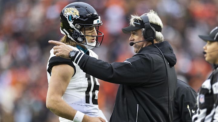 Dec 10, 2023; Cleveland, Ohio, USA; Jacksonville Jaguars head coach Doug Pederson talks with quarterback Trevor Lawrence (16) during the third quarter against the Cleveland Browns at Cleveland Browns Stadium. Mandatory Credit: Scott Galvin-USA TODAY Sports