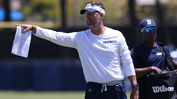 Dallas Cowboys coach Brian Schottenheimer during training camp at the River Ridge Playing Fields. Dallas Cowboys coach Brian Schottenheimer during training camp at the River Ridge Playing Fields.