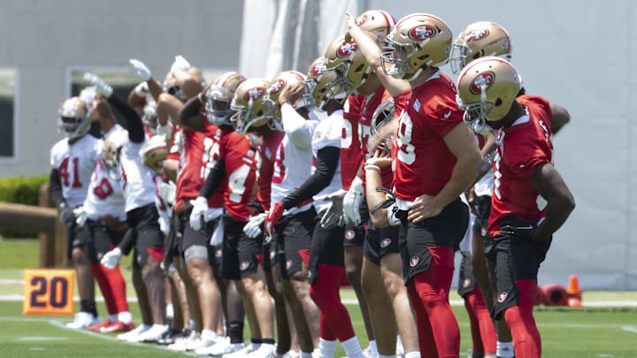 San Francisco 49ers players warm up 