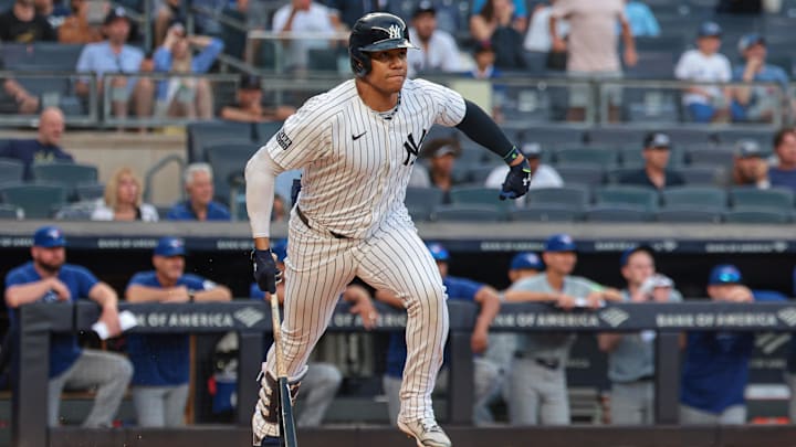 Aug 4, 2024; Bronx, New York, USA; New York Yankees right fielder Juan Soto (22) double during the eighth inning against the Toronto Blue Jays at Yankee Stadium. Mandatory Credit: Vincent Carchietta-Imagn Images