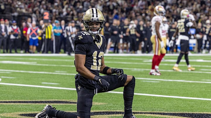 Sep 14, 2025; New Orleans, Louisiana, USA;  New Orleans Saints wide receiver Chris Olave (12) reacts to dropping a pass in the end zone against the San Francisco 49ers during the first half at Caesars Superdome. Mandatory Credit: Stephen Lew-Imagn Images