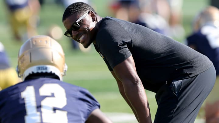 Notre Dame running backs coach Deland McCullough confers with freshman RB Jeremiyah Love during Notre Dame football fall camp Thursday, July 27, 2023, at the LaBar Practice Complex in South Bend. Notre Dame running backs coach Deland McCullough confers with freshman RB Jeremiyah Love during Notre Dame football fall camp Thursday, July 27, 2023, at the LaBar Practice Complex in South Bend.