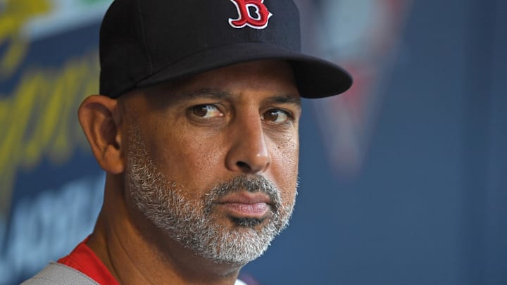 Jul 21, 2025; Philadelphia, Pennsylvania, USA; Boston Red Sox manager Alex Cora (13) in the dugout against the Philadelphia Phillies at Citizens Bank Park. Mandatory Credit: Eric Hartline-Imagn Images