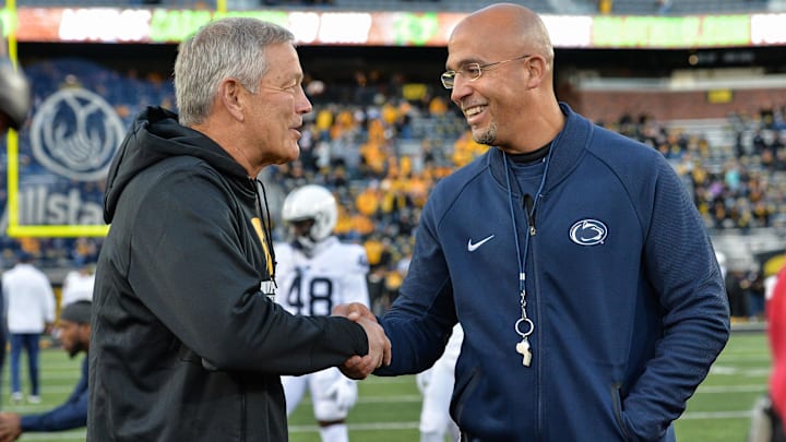 Oct 12, 2019; Iowa City, IA, USA; Penn State Nittany Lions head coach James Franklin (left) and Iowa Hawkeyes head coach Kirk Ferentz (right) shake hands before the game at Kinnick Stadium. Mandatory Credit: Jeffrey Becker-Imagn Images