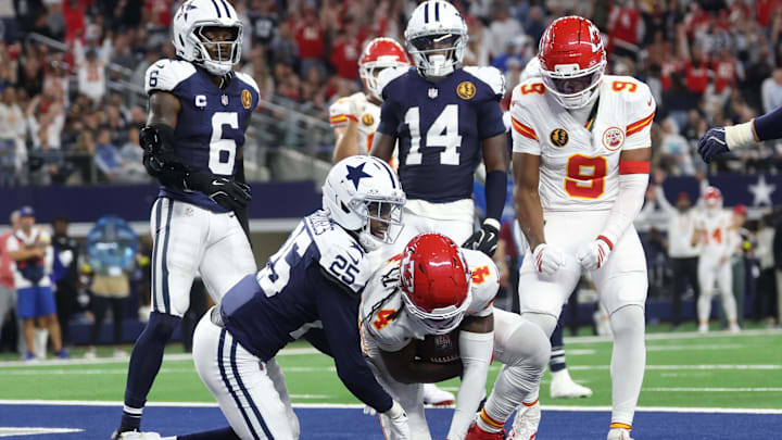 Nov 27, 2025; Arlington, Texas, USA; Kansas City Chiefs wide receiver Rashee Rice (4) catches a pass for a touchdown against Dallas Cowboys cornerback Trikweze Bridges (25) during the fourth quarter at AT&T Stadium. Mandatory Credit: Kevin Jairaj-Imagn Images | Kevin Jairaj-Imagn Images