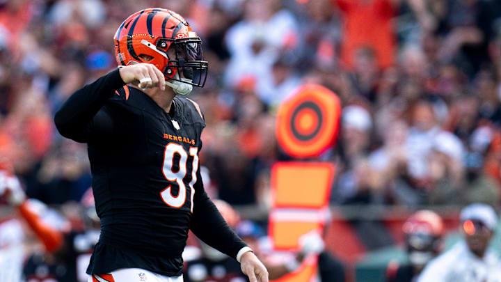 Cincinnati Bengals defensive end Trey Hendrickson (91) reacts after pressuring Las Vegas Raiders quarterback Desmond Ridder (10) who threw an incomplete pass in the fourth quarter of the NFL game at Paycor Stadium in Cincinnati on Sunday, Nov. 3, 2024. Cincinnati Bengals defensive end Trey Hendrickson (91) reacts after pressuring Las Vegas Raiders quarterback Desmond Ridder (10) who threw an incomplete pass in the fourth quarter of the NFL game at Paycor Stadium in Cincinnati on Sunday, Nov. 3, 2024.