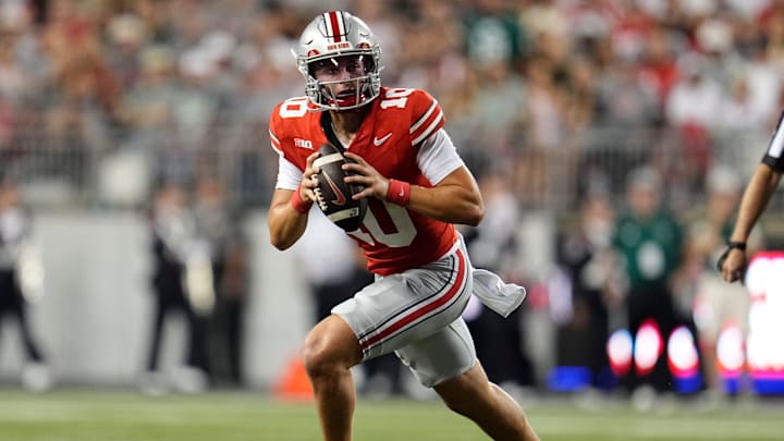 Ohio State Buckeyes quarterback Julian Sayin (10) runs during the first half of the NCAA football game against the Ohio Bobcats at Ohio Stadium on Sept. 13, 2025.