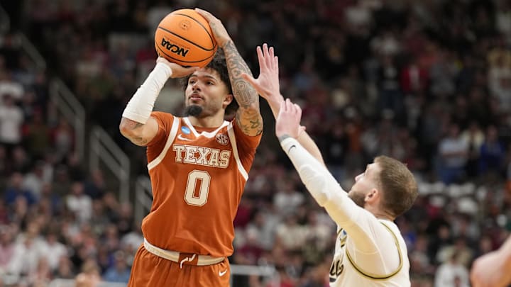 Mar 26, 2026; San Jose, CA, USA; Texas Longhorns guard Jordan Pope (0) shoots past Purdue Boilermakers guard Braden Smith (3) in the second half during a Sweet Sixteen. Mar 26, 2026; San Jose, CA, USA; Texas Longhorns guard Jordan Pope (0) shoots past Purdue Boilermakers guard Braden Smith (3) in the second half during a Sweet Sixteen.
