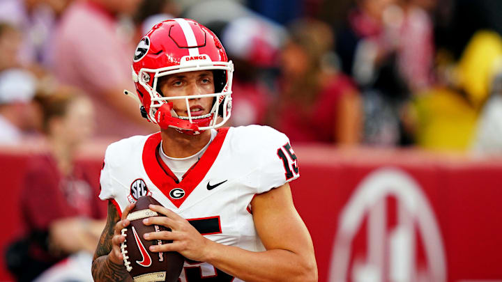 Sep 28, 2024; Tuscaloosa, Alabama, USA; Georgia Bulldogs quarterback Carson Beck (15) warms up before playing against the Alabama Crimson Tide at Bryant-Denny Stadium. Mandatory Credit: John David Mercer-Imagn Images