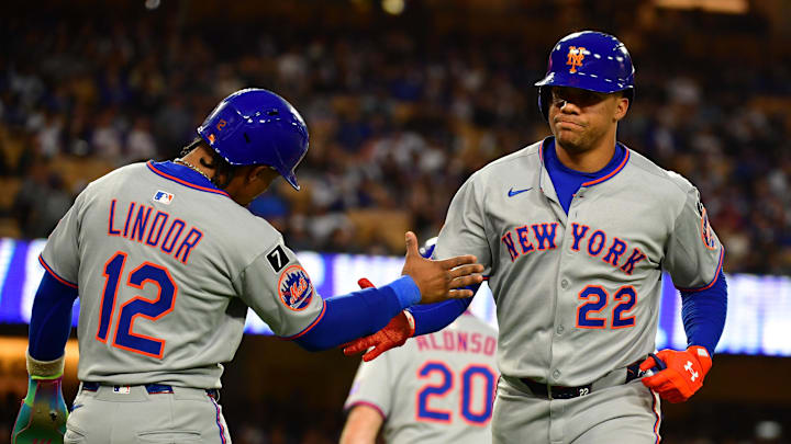 Jun 3, 2025; Los Angeles, California, USA; New York Mets outfielder Juan Soto (22) reacts with shortstop Francisco Lindor (12) after hitting a two run home run against the Los Angeles Dodgers during the third inning at Dodger Stadium. Mandatory Credit: Gary A. Vasquez-Imagn Images