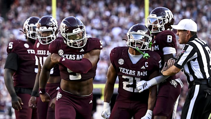 Texas A&M Aggies react after sacking Auburn Tigers quarterback Jackson Arnold during the fourth quarter at Kyle Field.