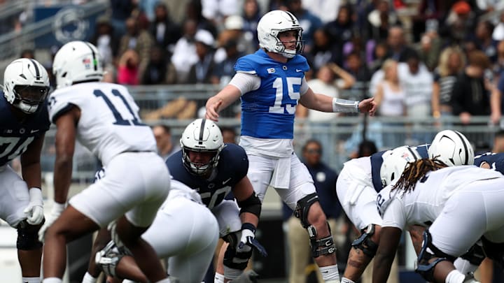 Penn State Nittany Lions quarterback Drew Allar (15) gestures at the line of scrimmage during the second quarter of the Blue-White Game at Beaver Stadium.
