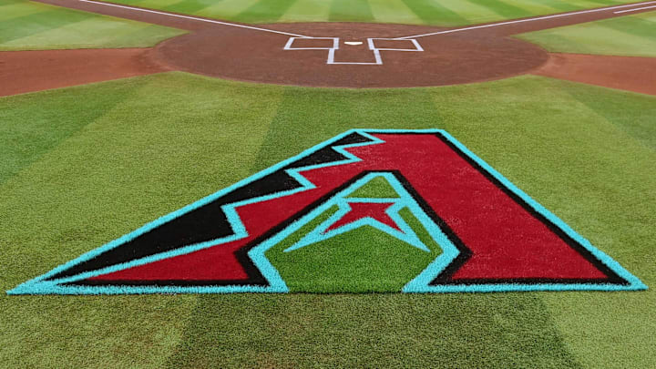 Apr 16, 2024; Phoenix, Arizona, USA; General view of the Arizona Diamondbacks logo on the field prior to the game against the Chicago Cubs at Chase Field. Mandatory Credit: Matt Kartozian-Imagn Images