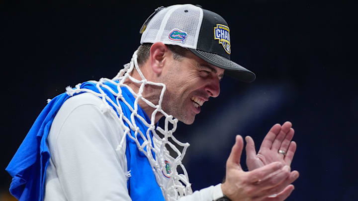 Florida head coach Todd Golden celebrates their win over Tennessee after the SEC tournament championship.