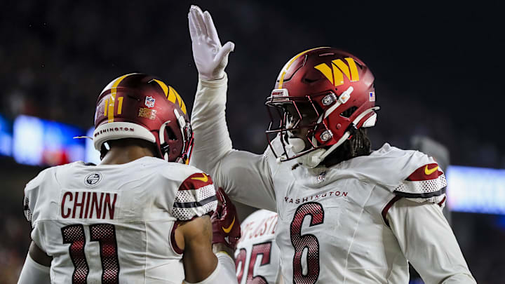 Washington Commanders EDGE Dante Fowler Jr. reacts with safety Jeremy Chinn. Washington Commanders EDGE Dante Fowler Jr. reacts with safety Jeremy Chinn.