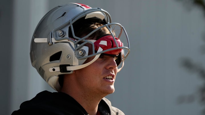 Aug 1, 2024; Columbus, OH, USA; Ohio State Buckeyes quarterback Will Howard (18) takes the field during football camp at the Woody Hayes Athletic Complex. Aug 1, 2024; Columbus, OH, USA; Ohio State Buckeyes quarterback Will Howard (18) takes the field during football camp at the Woody Hayes Athletic Complex.