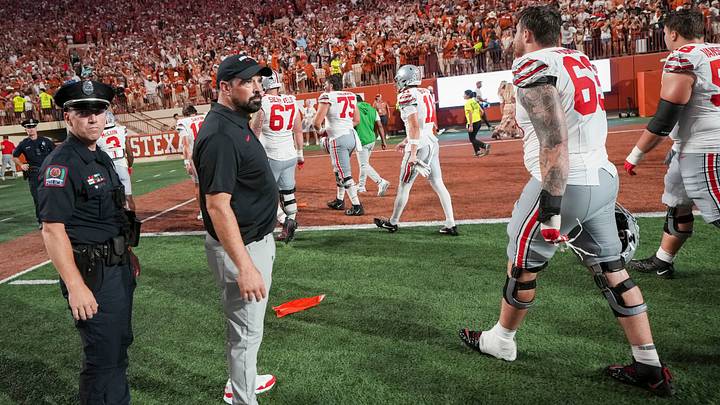 Ohio State Buckeyes head coach Ryan Day watches his players leave the field following the NCAA football game against the Texas Longhorns at Darrell K Royal–Texas Memorial Stadium in Austin, Texas on Sept. 12, 2026. Texas won 24-23.