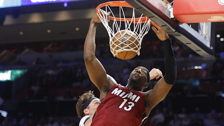 Mar 3, 2025; Miami, Florida, USA; Miami Heat center Bam Adebayo (13) dunks against the Washington Wizards during the first half at Kaseya Center. Mandatory Credit: Rhona Wise-Imagn Images Mar 3, 2025; Miami, Florida, USA; Miami Heat center Bam Adebayo (13) dunks against the Washington Wizards during the first half at Kaseya Center. Mandatory Credit: Rhona Wise-Imagn Images