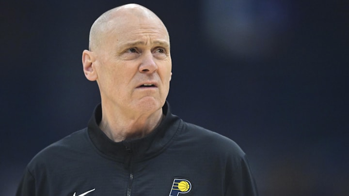 Apr 13, 2025; Cleveland, Ohio, USA; Indiana Pacers head coach Rick Carlisle stands on the court during a timeout in the first quarter against the Cleveland Cavaliers at Rocket Arena. Mandatory Credit: David Richard-Imagn Images