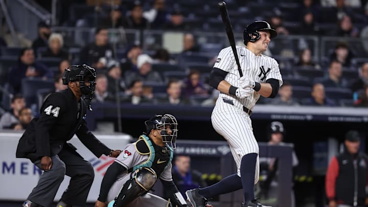 Apr 1, 2025; Bronx, New York, USA;  New York Yankees designated hitter Ben Rice (22) hits a double in the third inning against the Arizona Diamondbacks at Yankee Stadium.