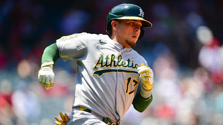 Jun 11, 2025; Anaheim, California, USA; Athletics second baseman Luis Urias (17) runs after hitting a triple against the Los Angeles Angels during the fourth inning at Angel Stadium. Mandatory Credit: Gary A. Vasquez-Imagn Images