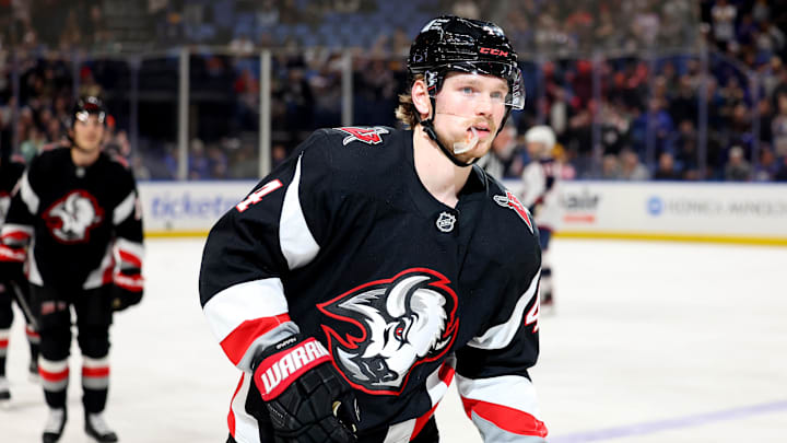 Feb 4, 2025; Buffalo, New York, USA;  Buffalo Sabres defenseman Bowen Byram (4) celebrates his goal during the first period against the Columbus Blue Jackets at KeyBank Center. Mandatory Credit: Timothy T. Ludwig-Imagn Images