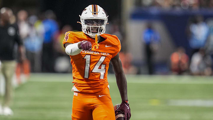 Aug 31, 2025; Atlanta, Georgia, USA; Virginia Tech Hokies wide receiver Isaiah Spencer (14) reacts after making a catch against the South Carolina Gamecocks during the second half at Mercedes-Benz Stadium. Mandatory Credit: Dale Zanine-Imagn Images