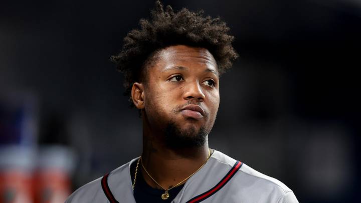 May 18, 2026; Miami, Florida, USA; Atlanta Braves right fielder Ronald Acuna (13) looks on from inside the dugout against the Miami Marlins during the fourth inning at loanDepot Park. Mandatory Credit: Sam Navarro-Imagn Images