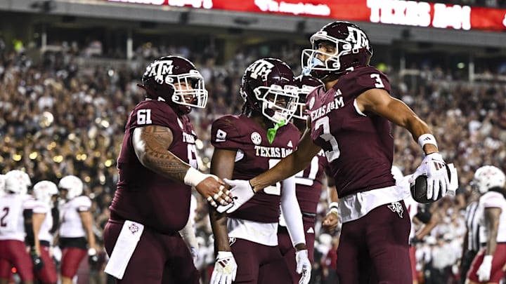 Nov 16, 2024; College Station, Texas, USA; Texas A&M Aggies wide receiver Noah Thomas (3) celebrates after scoring a touchdown with teammates during the first quarter against the New Mexico State Aggies at Kyle Field. Mandatory Credit: Maria Lysaker-Imagn Images 