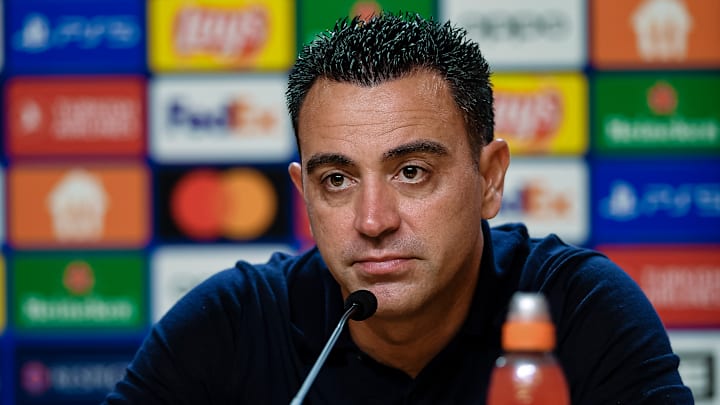 Xavi speaking at a press conference before Barcelona's Champions League clash with Porto Xavi speaking at a press conference before Barcelona's Champions League clash with Porto